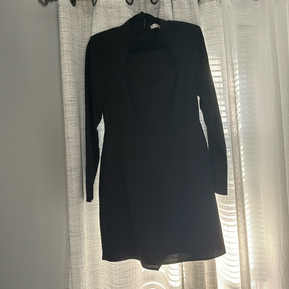 Black long sleeve dress with cut out detail
